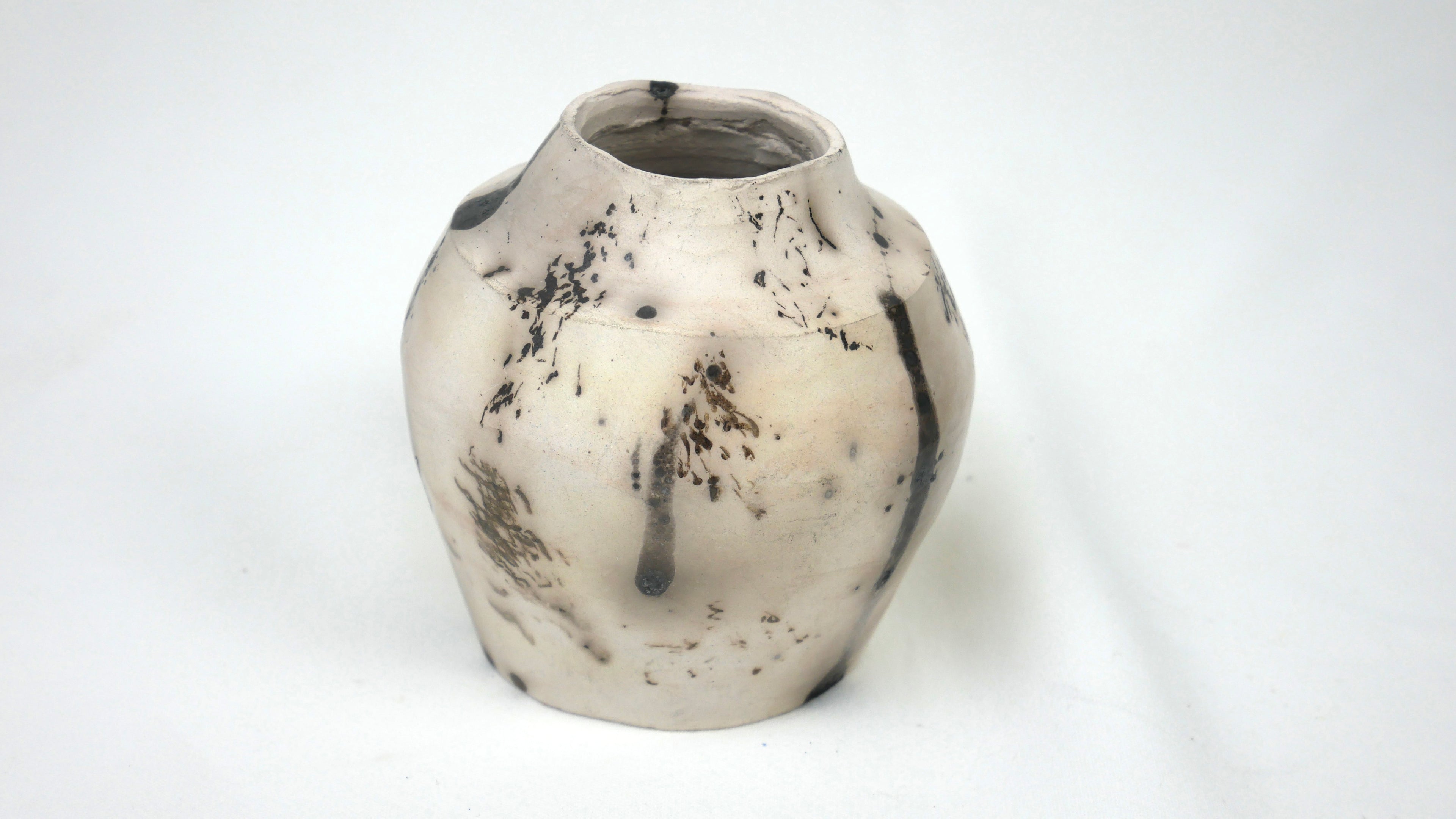 Raku organic burned